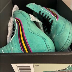 Teal Sneakers with Multicolor Stripes